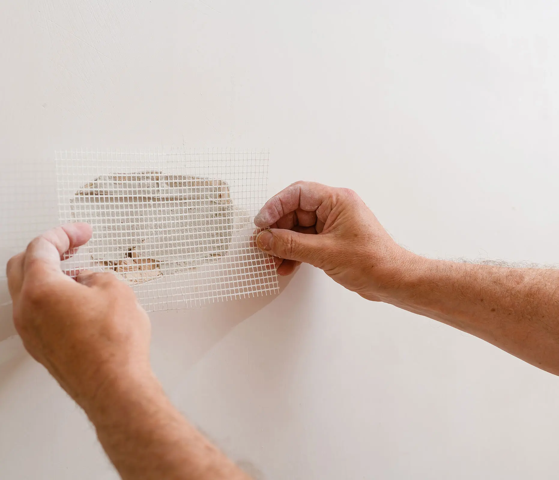 Drywall Patching By Hand